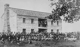 Delegates from 34 tribes in front of Creek Council House, Indian Territory