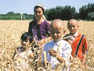 Wheat-farming family in Uzbekistan, c. 1999